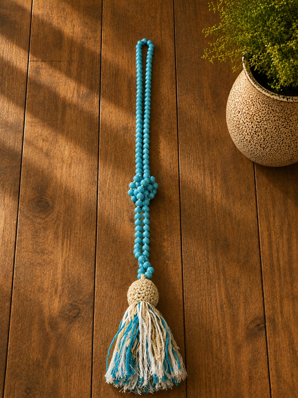 Collana artigianale lunga con nappina